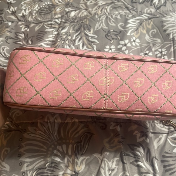 Authentic Dooney and Bourke. Canvas gently used leather still like new - Picture 4 of 5